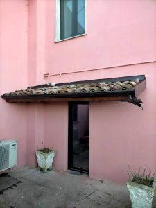 tettoia copri-ingresso, copertura in coppi, lattoneria
